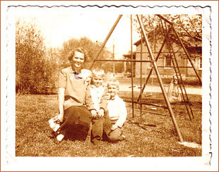 Carol Guenthner and sons Joe (center) and Bob pose in the 1950s at their Wisconsin farm where they grew, packed, and shipped potatoes.